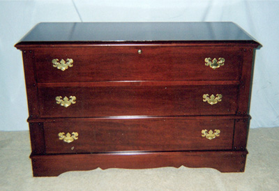  The chest fully repaired and refinished.